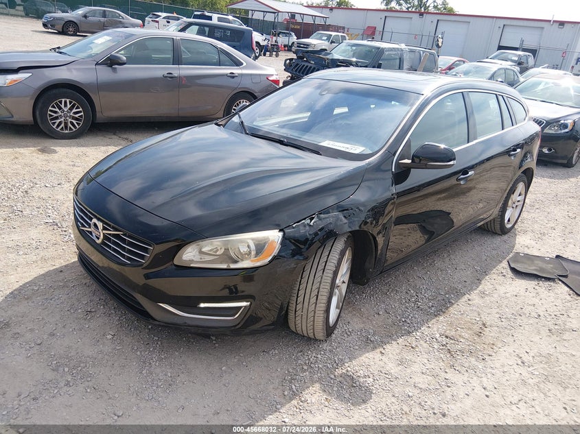 2015 Volvo V60 VIN YV140MEBXF1207429 IAAI salvage auction — LEFT FRONT, Salvage Title, sold $675 on 2026-08-17 (photo 2)
