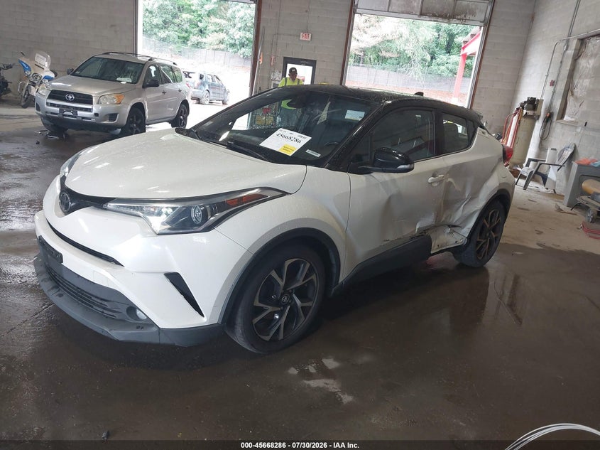 2019 Toyota C-HR VIN NMTKHMBX9KR083798 IAAI salvage auction — Left Side, Salvage, sold $6,975 on 2026-10-09 (photo 2)