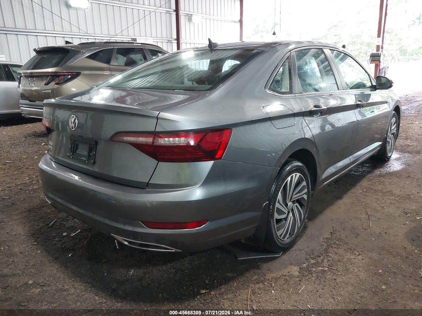 2021 Volkswagen Jetta VIN 3VWG57BU2MM092902 IAAI salvage auction — LEFT SIDE, Salvage Title, sold $5,600 on 2026-09-17 (photo 4)