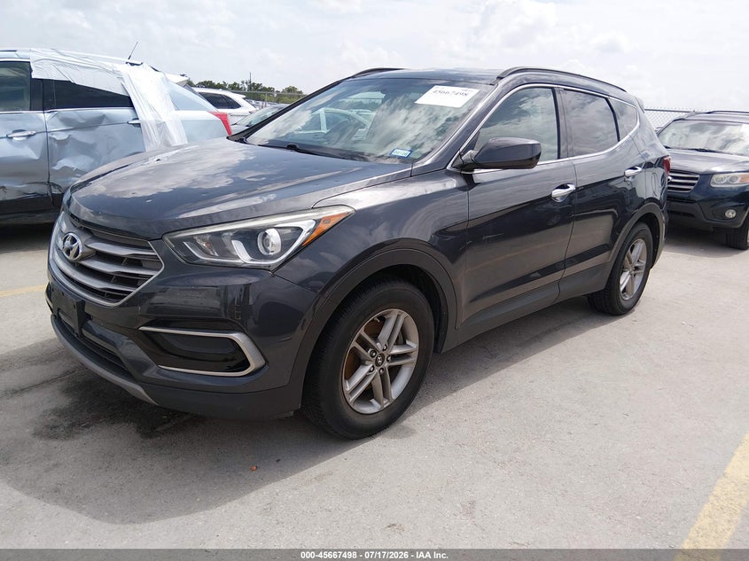 2017 Hyundai Santa fe VIN 5XYZTDLB6HG458652 IAAI salvage auction — NORMAL WEAR, Original (Texas), sold $925 on 2026-07-30 (photo 2)