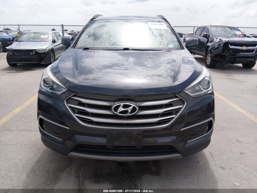 2017 Hyundai Santa fe VIN 5XYZTDLB6HG458652 IAAI salvage auction — NORMAL WEAR, Original (Texas), sold $925 on 2026-07-30 (photo 6)