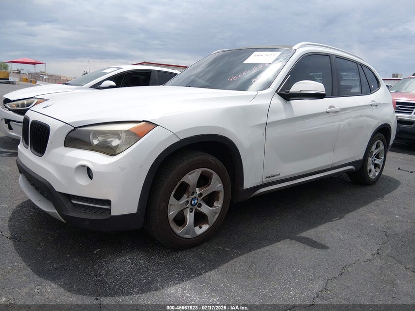 2014 BMW X1 VIN WBAVM1C55EVW46858 IAAI salvage auction — NORMAL WEAR, Regular (Nevada), sold $800 on 2026-07-31 (photo 2)
