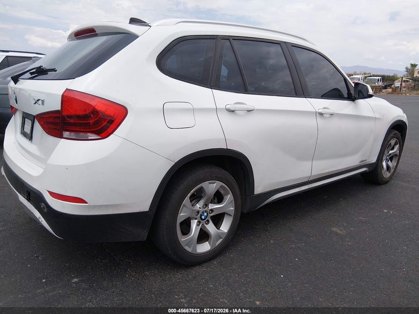 2014 BMW X1 VIN WBAVM1C55EVW46858 IAAI salvage auction — NORMAL WEAR, Regular (Nevada), sold $800 on 2026-07-31 (photo 4)