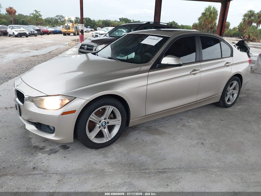 2015 BMW 3er VIN WBA3A5C53FP605089 IAAI salvage auction — NORMAL WEAR, Clear (Florida), sold $475 on 2026-07-28 (photo 2)