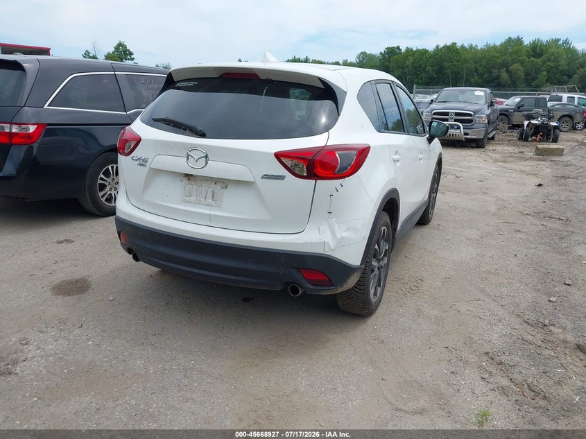 2016 Mazda Cx-5 VIN JM3KE4DY0G0694028 IAAI salvage auction — NORMAL WEAR, Salvage Title, sold $1,150 on 2026-07-27 (photo 4)