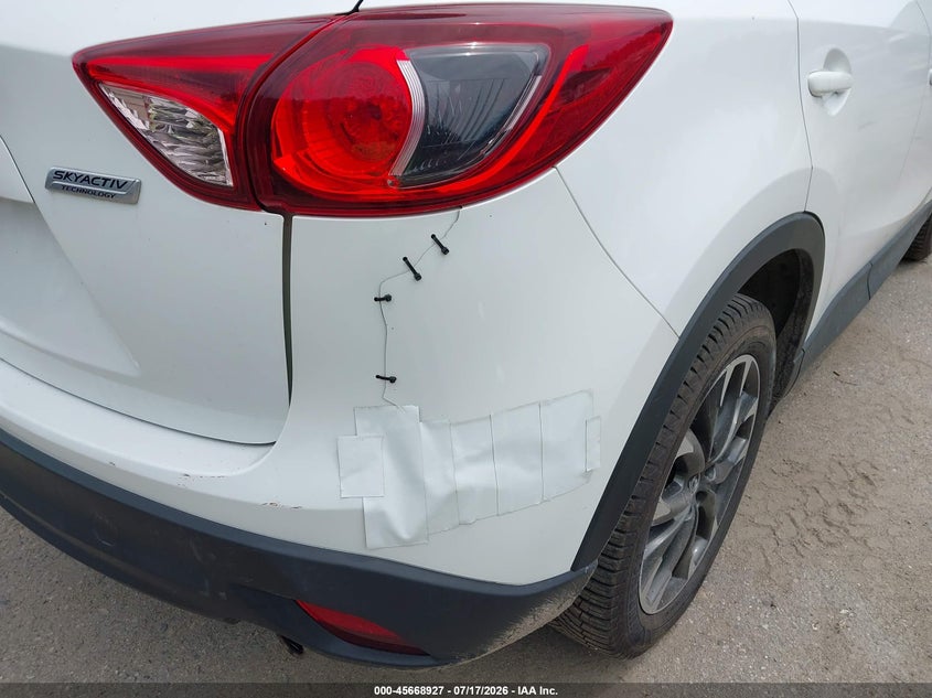 2016 Mazda Cx-5 VIN JM3KE4DY0G0694028 IAAI salvage auction — NORMAL WEAR, Salvage Title, sold $1,150 on 2026-07-27 (photo 6)