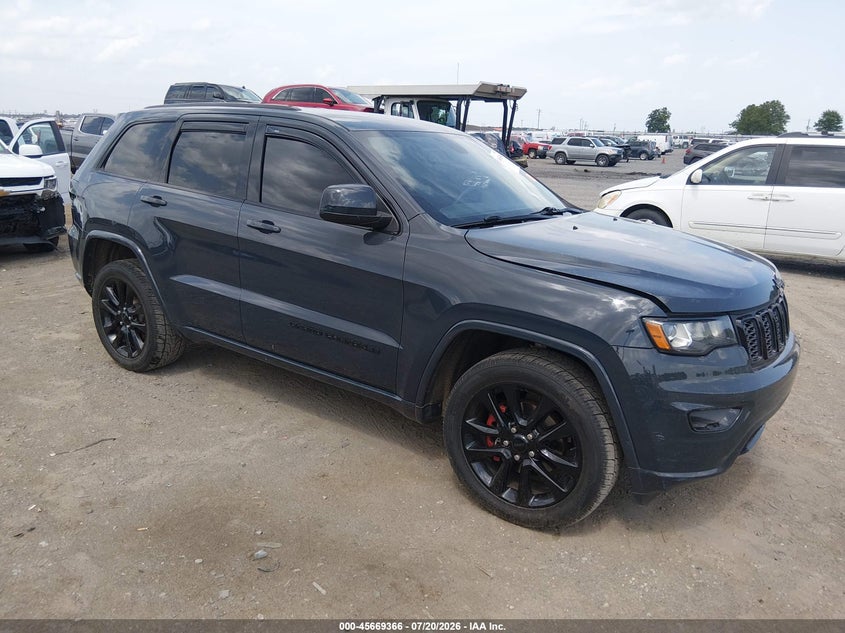2018 Jeep Grand cherokee VIN 1C4RJFAG7JC410314 IAAI salvage auction — LEFT SIDE, Salvage Title, sold $5,600 on 2026-08-20 (photo 1)