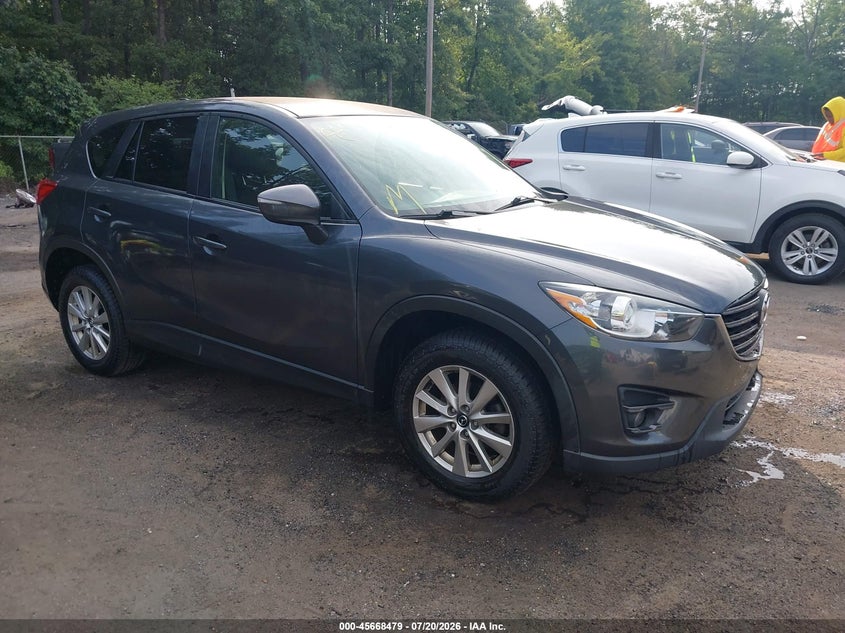 2016 Mazda Cx-5 VIN JM3KE4CY6G0858626 IAAI salvage auction — SIDE, Wait Title, sold $3,100 on 2026-08-01 (photo 1)