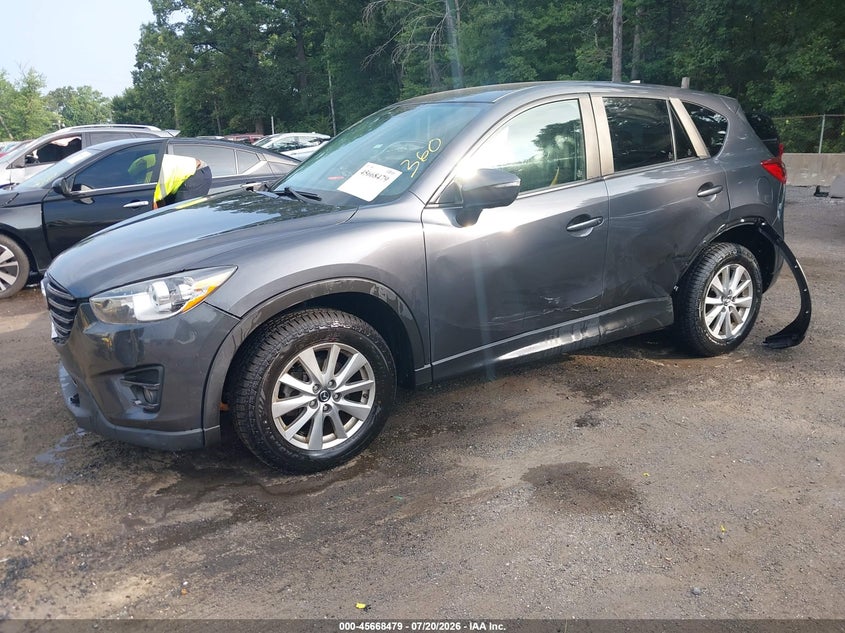 2016 Mazda Cx-5 VIN JM3KE4CY6G0858626 IAAI salvage auction — SIDE, Wait Title, sold $3,100 on 2026-08-01 (photo 2)