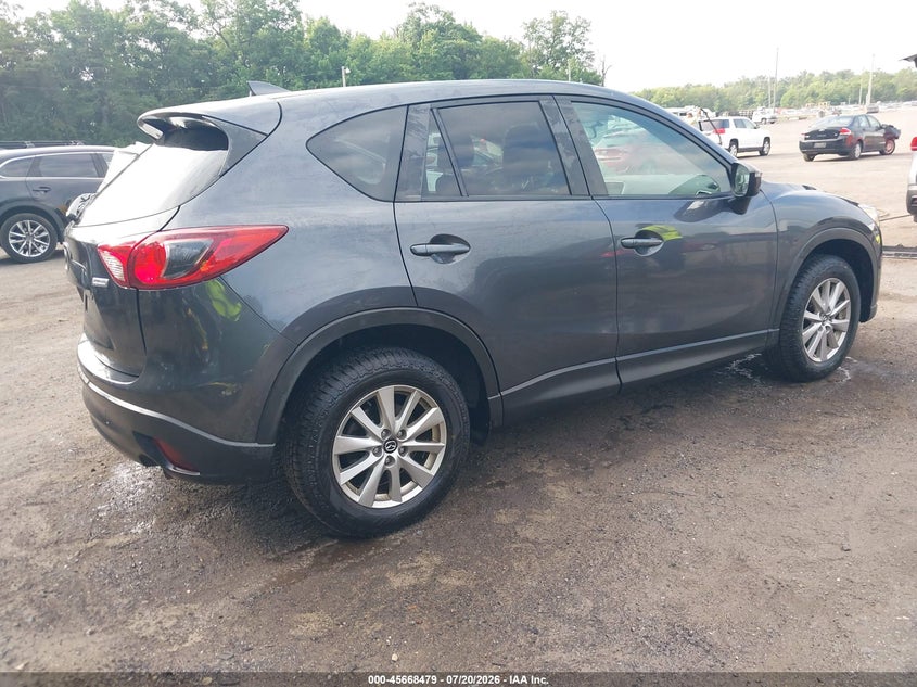 2016 Mazda Cx-5 VIN JM3KE4CY6G0858626 IAAI salvage auction — SIDE, Wait Title, sold $3,100 on 2026-08-01 (photo 4)