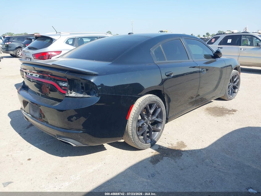 2022 Dodge Charger VIN 2C3CDXBG3NH129880 IAAI salvage auction — REAR END, Salvage (Texas), sold $8,500 on 2026-08-07 (photo 4)