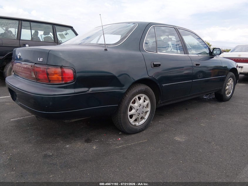 1992 Toyota Camry VIN JT2SK12E1N0035941 IAAI salvage auction — NORMAL WEAR, Clear (Nevada), sold $225 on 2026-07-31 (photo 4)