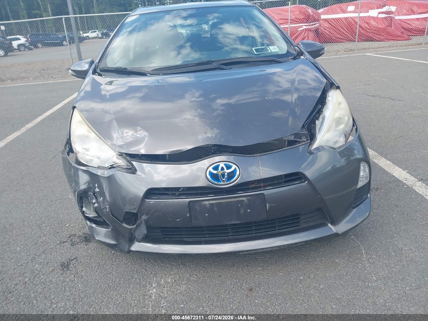 2013 Toyota Prius c VIN JTDKDTB30D1040424 IAAI salvage auction — NORMAL WEAR, Clear (New York), sold $25 on 2026-07-30 (photo 6)