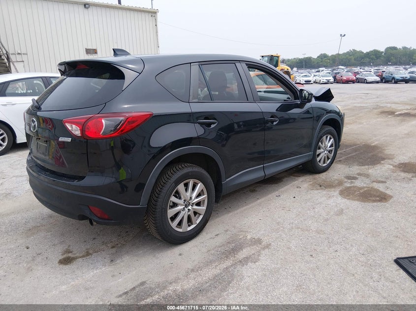 2014 Mazda Cx-5 VIN JM3KE4CY4E0422578 IAAI salvage auction — RIGHT FRONT, Salvage Title, sold $1,750 on 2026-09-01 (photo 4)