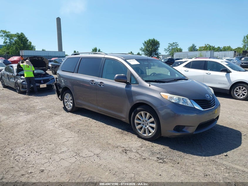 2014 Toyota Sienna VIN 5TDJK3DC3ES090303 — IAAI salvage auction photo