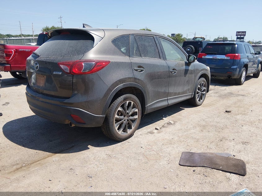 2016 Mazda Cx-5 VIN JM3KE4DY8G0627242 IAAI salvage auction — NORMAL WEAR, Clear (Kansas), sold $2,150 on 2026-07-31 (photo 4)