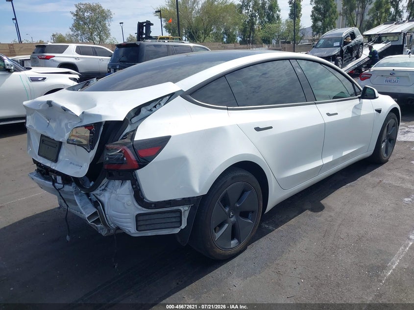 2023 Tesla Model 3 VIN 5YJ3E1EB8PF636269 IAAI salvage auction — REAR END, Wait Title, sold $7,050 on 2026-07-31 (photo 4)