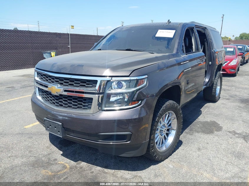 2015 Chevrolet Suburban VIN 1GNSKJKC4FR224187 IAAI salvage auction — LEFT SIDE, Salvage (California), sold $3,400 on 2026-07-29 (photo 2)