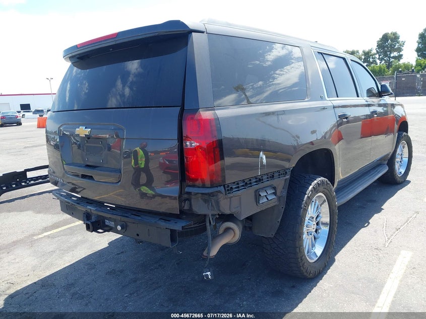 2015 Chevrolet Suburban VIN 1GNSKJKC4FR224187 IAAI salvage auction — LEFT SIDE, Salvage (California), sold $3,400 on 2026-07-29 (photo 4)