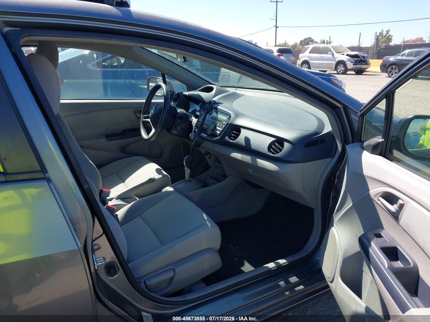 2010 Honda Insight VIN JHMZE2H55AS010421 IAAI salvage auction — NORMAL WEAR, Clear - Dealer Only (California), sold $25 on 2026-07-30 (photo 5)