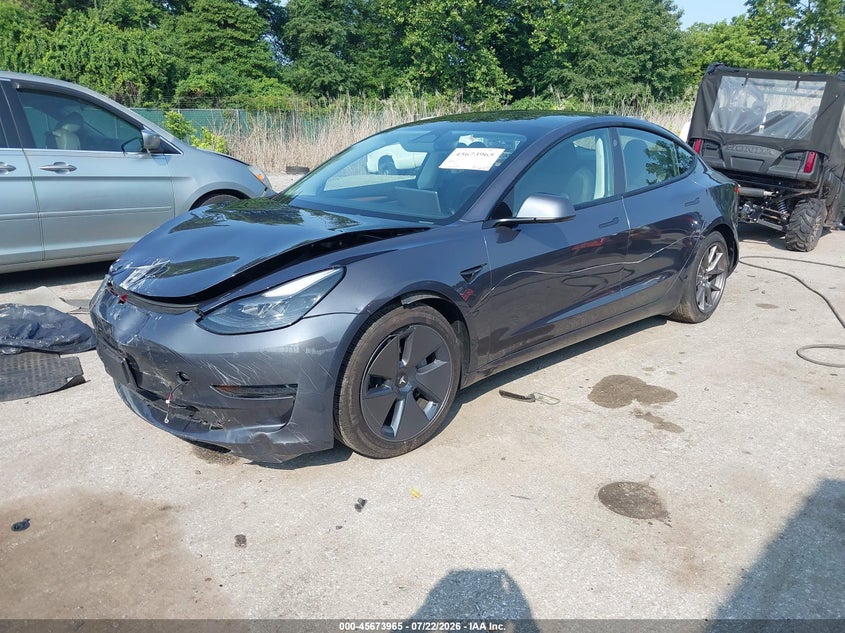 2023 Tesla Model 3 VIN 5YJ3E1EA7PF668542 IAAI salvage auction — FRONT & REAR, Wait Title, sold $6,600 on 2026-08-01 (photo 2)