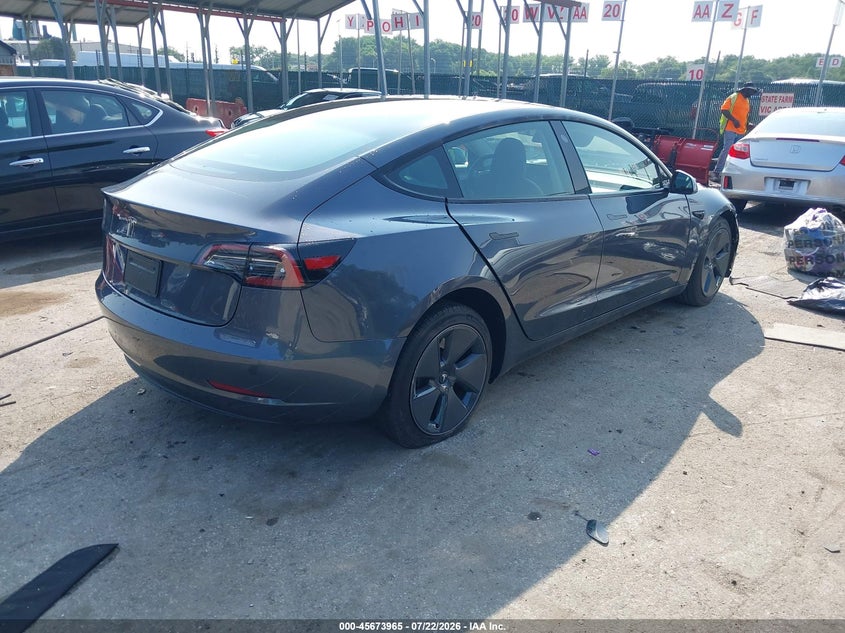 2023 Tesla Model 3 VIN 5YJ3E1EA7PF668542 IAAI salvage auction — FRONT & REAR, Wait Title, sold $6,600 on 2026-08-01 (photo 4)