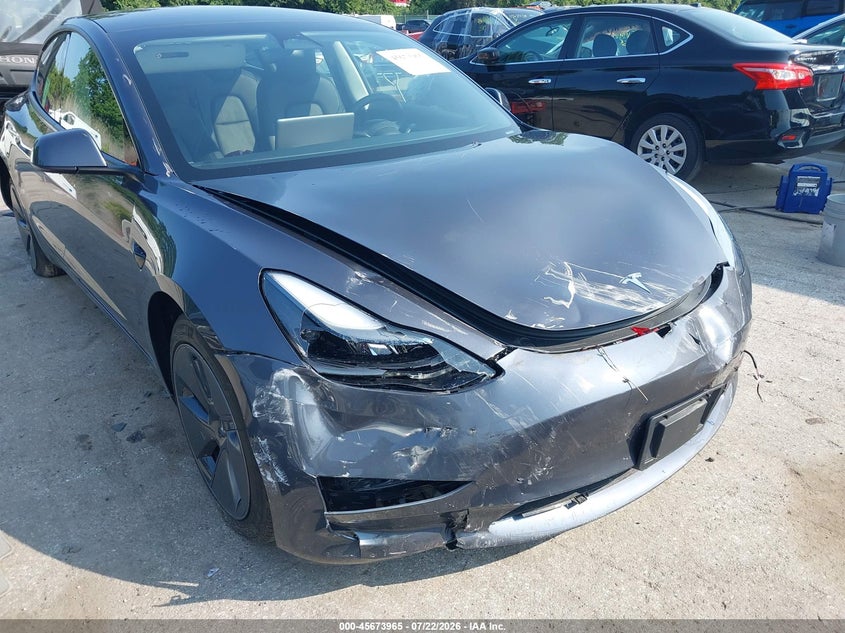 2023 Tesla Model 3 VIN 5YJ3E1EA7PF668542 IAAI salvage auction — FRONT & REAR, Wait Title, sold $6,600 on 2026-08-01 (photo 6)