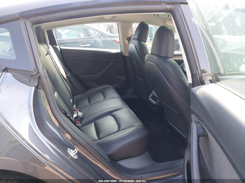 2023 Tesla Model 3 VIN 5YJ3E1EA7PF668542 IAAI salvage auction — FRONT & REAR, Wait Title, sold $6,600 on 2026-08-01 (photo 8)