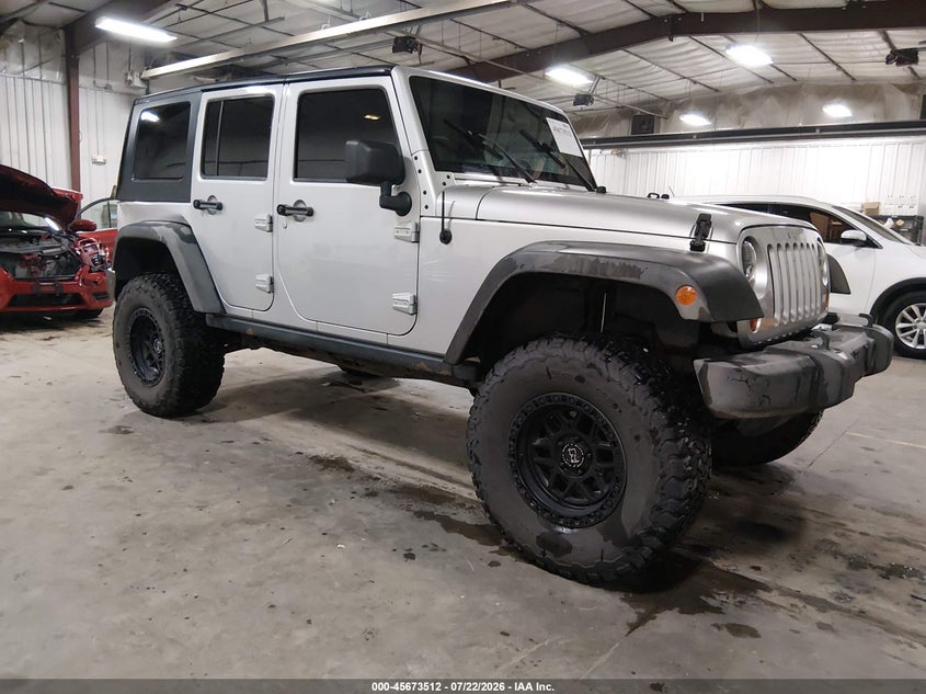 2010 Jeep Wrangler unlimited VIN 1J4BA6H12AL169727 — IAAI salvage auction photo