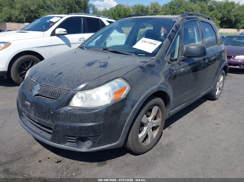 2012 Suzuki Sx4 VIN JS2YB5A35C6307500 IAAI salvage auction — NORMAL WEAR, Clear (Montana), sold $500 on 2026-08-01 (photo 2)