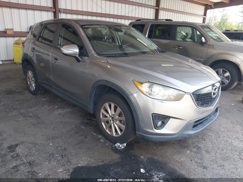 2015 Mazda Cx-5 VIN JM3KE2CY9F0510497 IAAI salvage auction — NORMAL WEAR, Clear (Florida), sold $1,250 on 2026-07-28 (photo 1)
