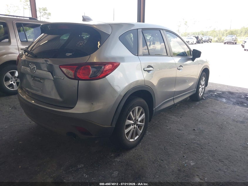 2015 Mazda Cx-5 VIN JM3KE2CY9F0510497 IAAI salvage auction — NORMAL WEAR, Clear (Florida), sold $1,250 on 2026-07-28 (photo 4)