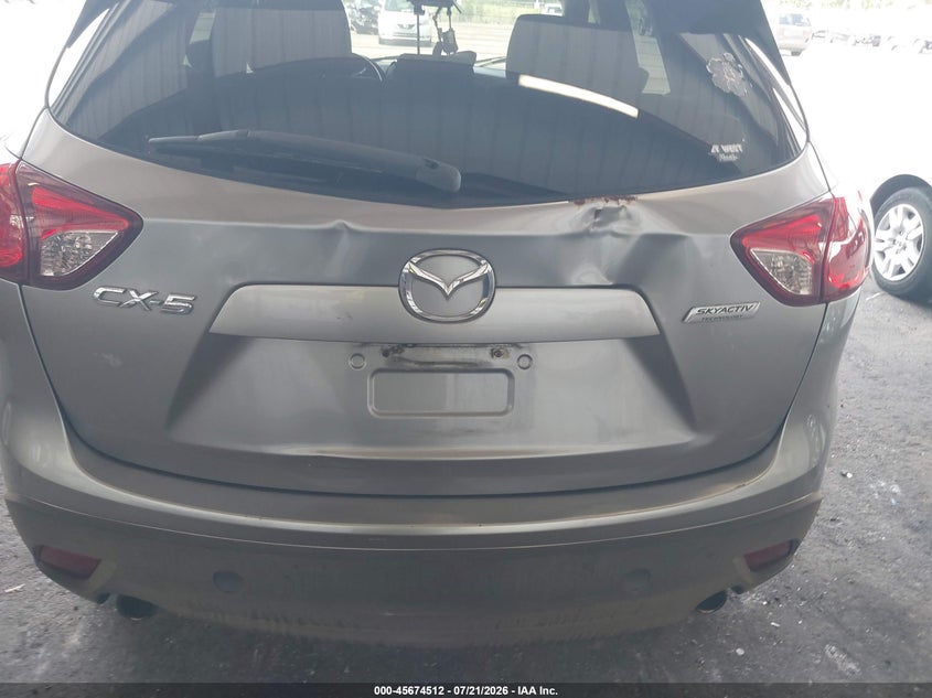 2015 Mazda Cx-5 VIN JM3KE2CY9F0510497 IAAI salvage auction — NORMAL WEAR, Clear (Florida), sold $1,250 on 2026-07-28 (photo 6)