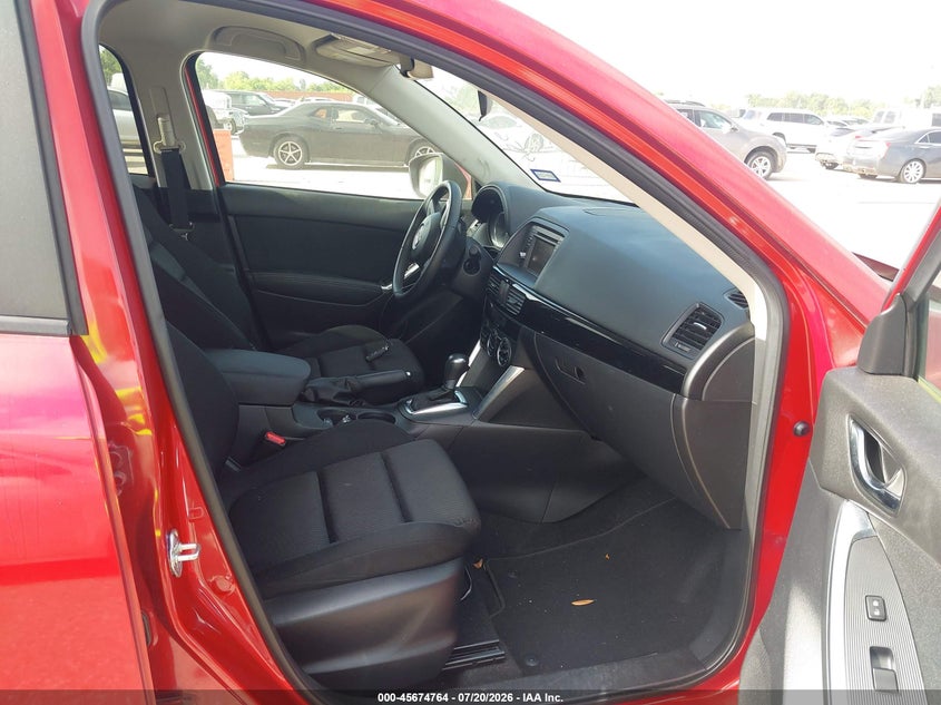 2014 Mazda Cx-5 VIN JM3KE2CY6E0428726 IAAI salvage auction — NORMAL WEAR, Original (Texas), sold $25 on 2026-07-29 (photo 5)
