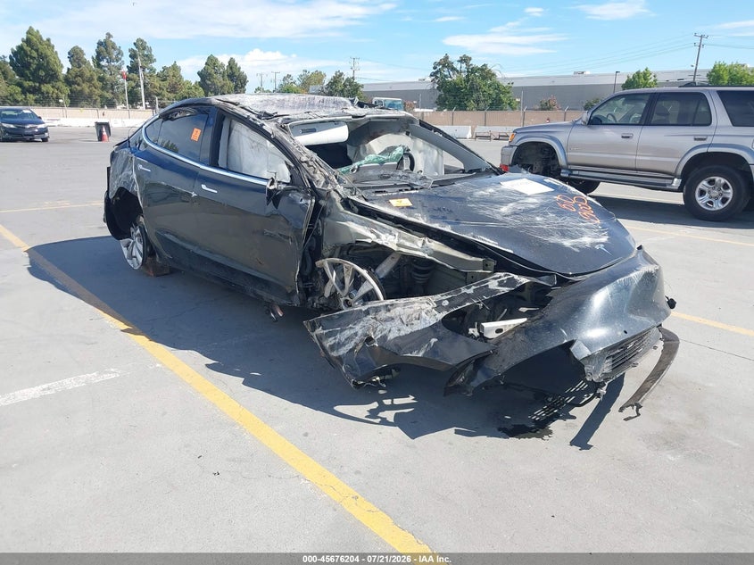 2018 Tesla Model 3 VIN 5YJ3E1EB9JF120901 IAAI salvage auction — ROLLOVER, Non-Repairable (California), sold $450 on 2026-08-31 (photo 1)