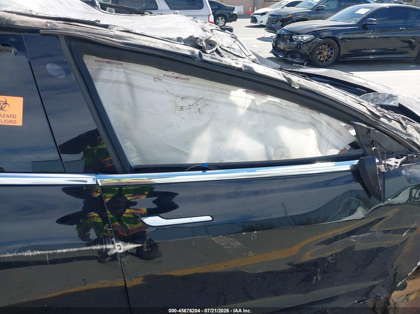 2018 Tesla Model 3 VIN 5YJ3E1EB9JF120901 IAAI salvage auction — ROLLOVER, Non-Repairable (California), sold $450 on 2026-08-31 (photo 5)