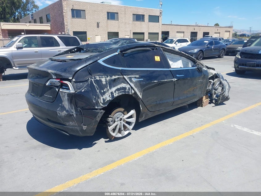 2018 Tesla Model 3 VIN 5YJ3E1EB9JF120901 IAAI salvage auction — ROLLOVER, Non-Repairable (California), sold $450 on 2026-08-31 (photo 4)