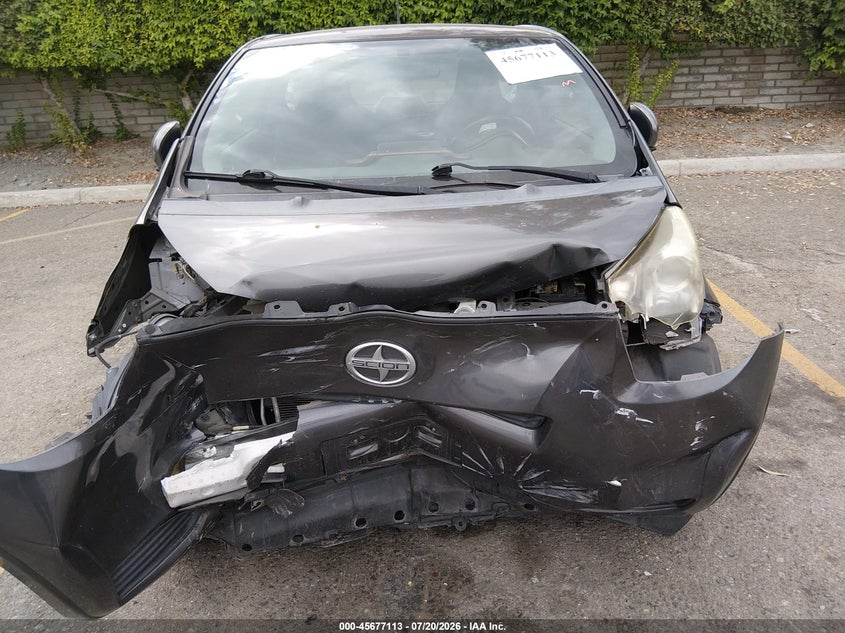 2012 Scion Iq VIN JTNJJXB02CJ009588 IAAI salvage auction — FRONT & REAR, Salvage Title, sold $625 on 2026-08-18 (photo 6)