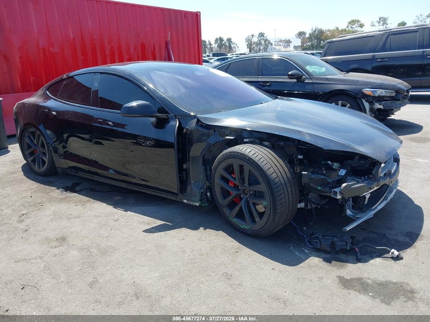 2023 Tesla Model s VIN 5YJSA1E60PF530859 — IAAI salvage auction photo
