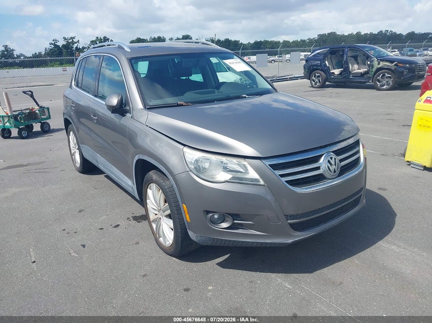 2010 Volkswagen Tiguan VIN WVGBV7AX4AW509064 IAAI salvage auction — NORMAL WEAR, Clear (Florida), sold $25 on 2026-07-29 (photo 1)