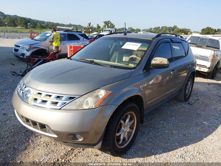 2004 Nissan Murano VIN JN8AZ08W64W329294 IAAI salvage auction — NORMAL WEAR, Clear (Arkansas), sold $25 on 2026-07-30 (photo 6)