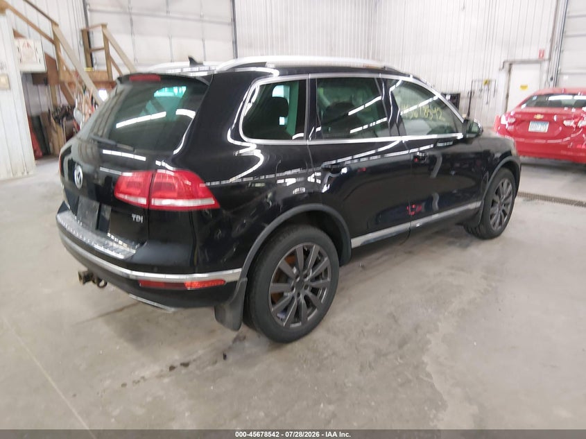 2016 Volkswagen Touareg VIN WVGEP9BP2GD003304 IAAI salvage auction — NORMAL WEAR, Clear (Minnesota), sold $4,150 on 2026-08-11 (photo 4)