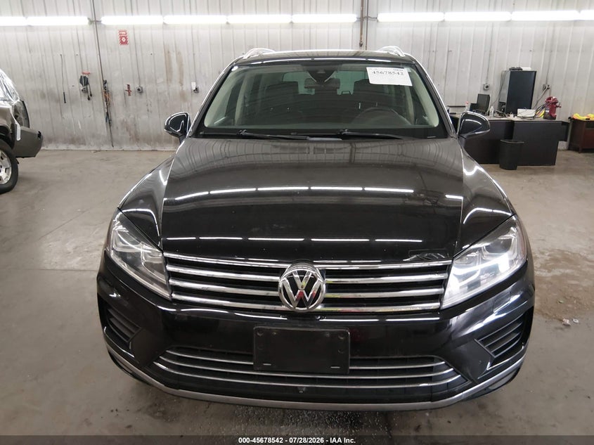 2016 Volkswagen Touareg VIN WVGEP9BP2GD003304 IAAI salvage auction — NORMAL WEAR, Clear (Minnesota), sold $4,150 on 2026-08-11 (photo 6)