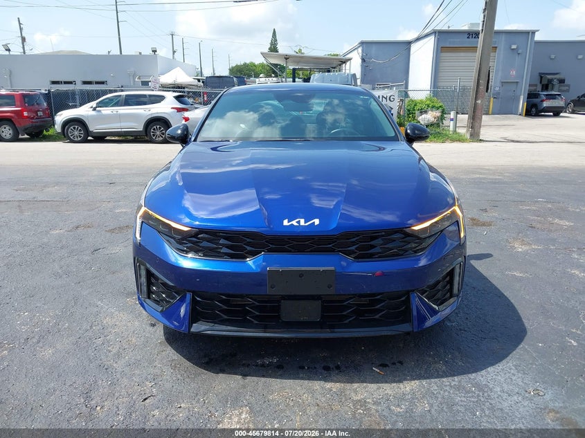 2026 Kia K5 VIN KNAG64J70T5411077 IAAI salvage auction — NORMAL WEAR, Salvage (Florida), sold $50 on 2026-07-23 (photo 6)