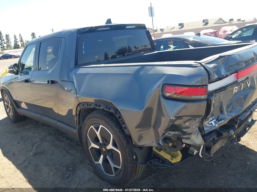 2023 Rivian R1t VIN 7FCTGBAA2PN025064 IAAI salvage auction — REAR END, Wait Title, sold $17,150 on 2026-08-25 (photo 6)