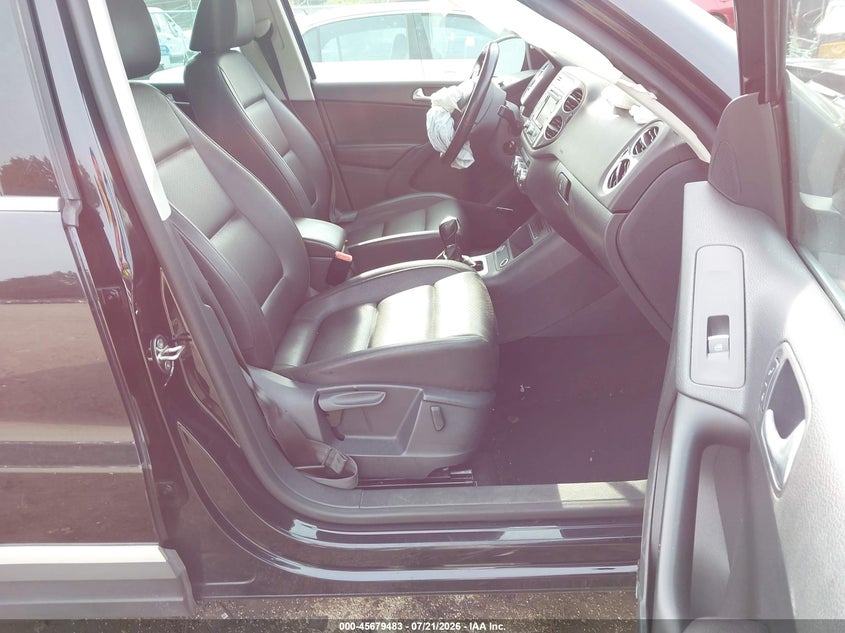 2014 Volkswagen Tiguan VIN WVGBV3AX9EW562762 IAAI salvage auction — FRONT END, Salvage Title, sold $425 on 2026-08-14 (photo 5)