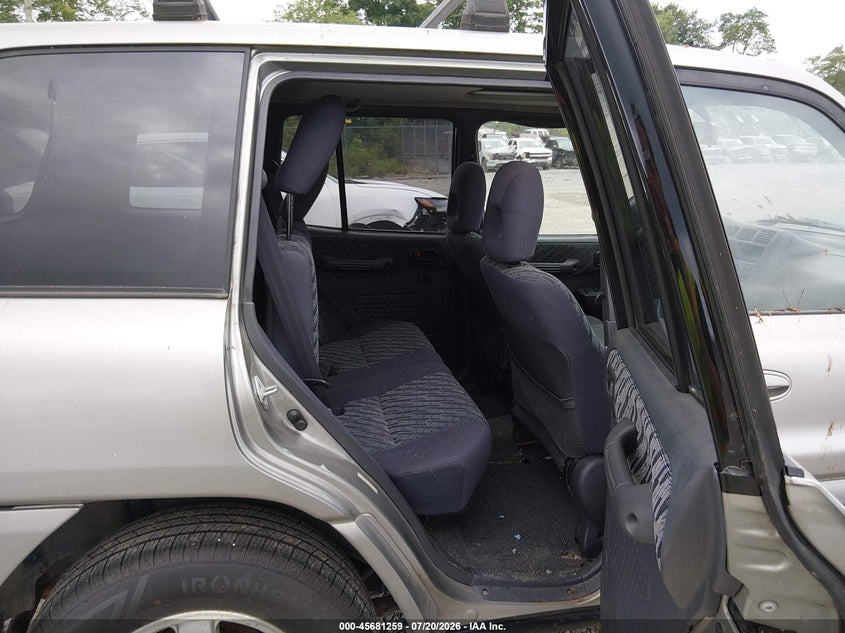 1999 Toyota Rav4 VIN JT3GP10VXX7057324 IAAI salvage auction — NORMAL WEAR, Original (West Virginia), sold $25 on 2026-07-29 (photo 8)