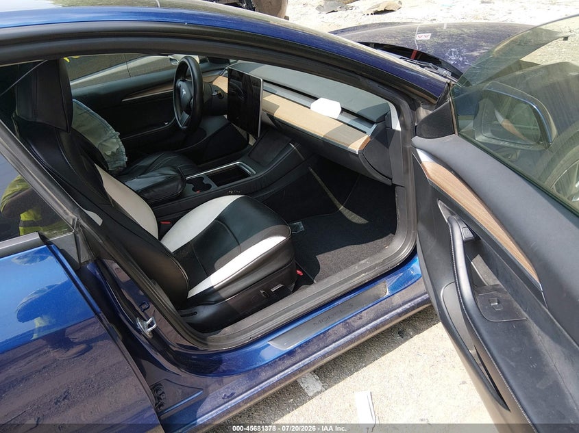 2023 Tesla Model 3 VIN 5YJ3E1EB5PF415650 IAAI salvage auction — NORMAL WEAR, Clear (Indiana), sold $4,650 on 2026-07-22 (photo 5)