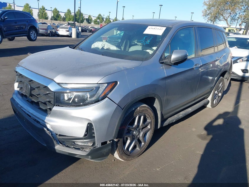 2023 Honda Passport VIN 5FNYF8H54PB019615 IAAI salvage auction — FRONT & REAR, Salvage Title, sold $9,475 on 2026-08-21 (photo 2)