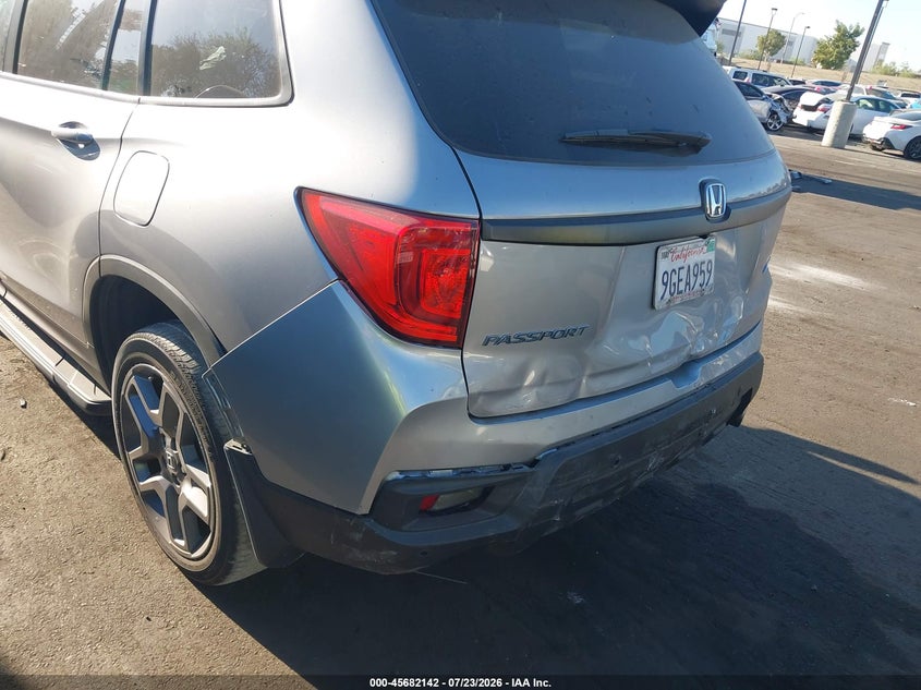 2023 Honda Passport VIN 5FNYF8H54PB019615 IAAI salvage auction — FRONT & REAR, Salvage Title, sold $9,475 on 2026-08-21 (photo 6)